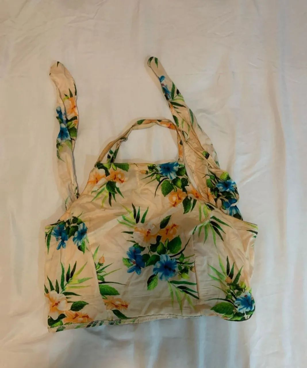 Conjunto top cropped floral + saia longa 