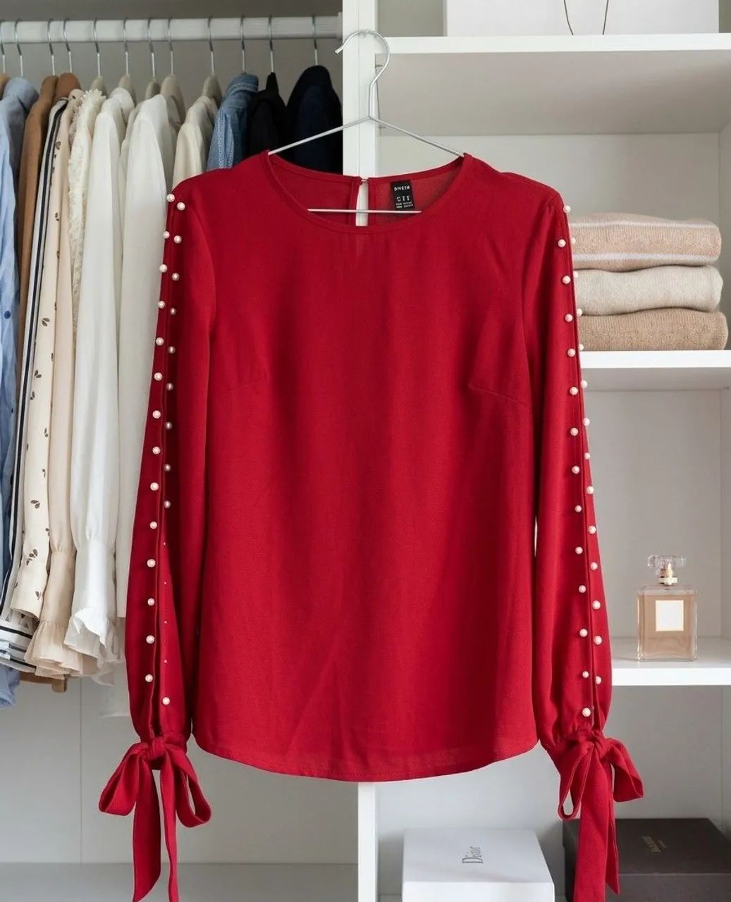 Blusa seminova