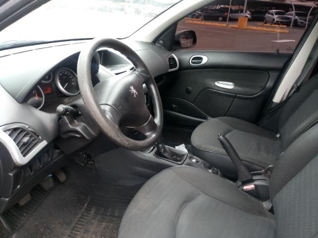 Peugeot 207 1.4 8v Flex 4 portas, Direção Hidraulica e Vidros Eletricos baixa Km - Foto 4