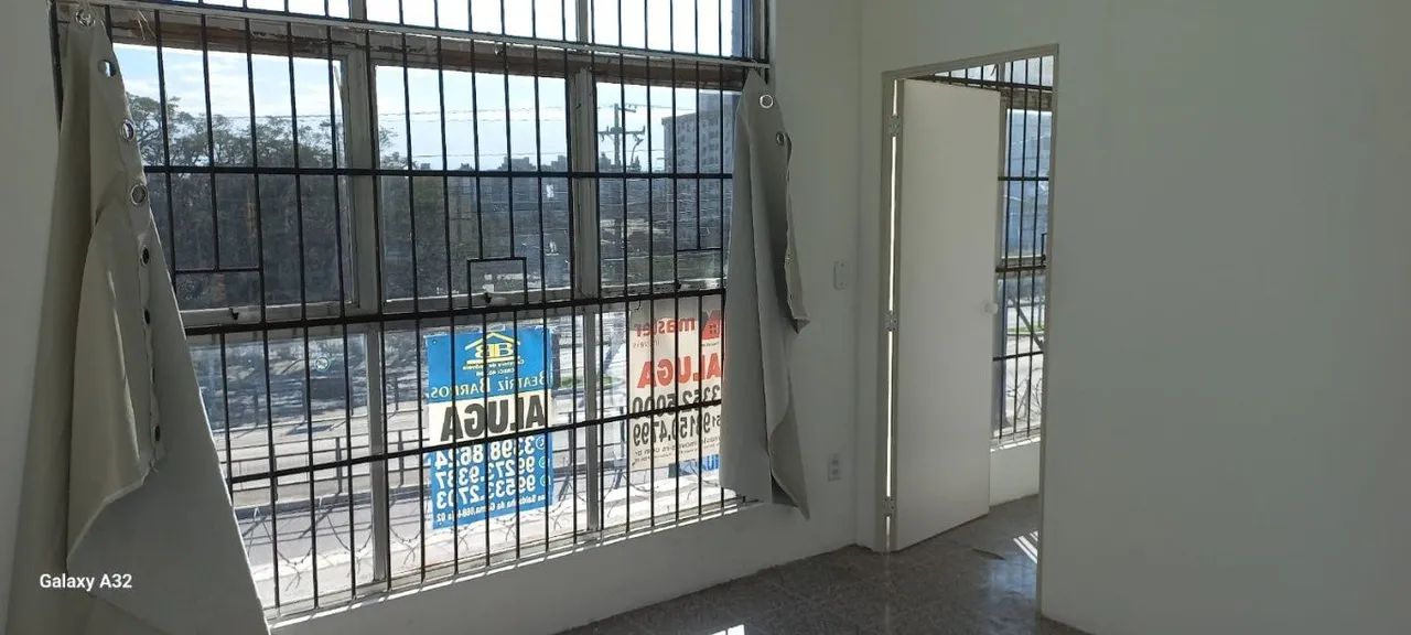prédio com 2 lojas e 2 salas 8 garagens - Foto 4