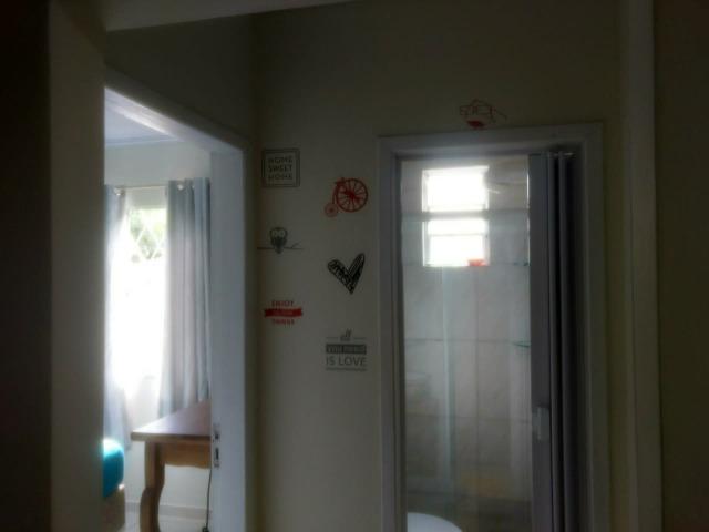 Alugo casa com dois quartos - Foto 4