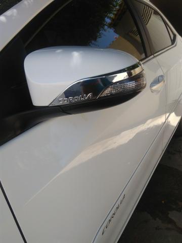 Vendo ou troco em carro de valor ate 30 mil,este corolla gli 2018 com acessorios do xei - Foto 14