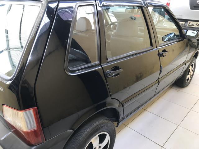 Fiat Uno Mille Fire Flex com AR Condicionado! - Foto 6