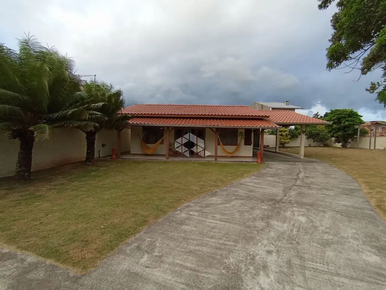 Terreno com  600m² com casa 120m²  sendo 1 suite + 2 - Foto 4