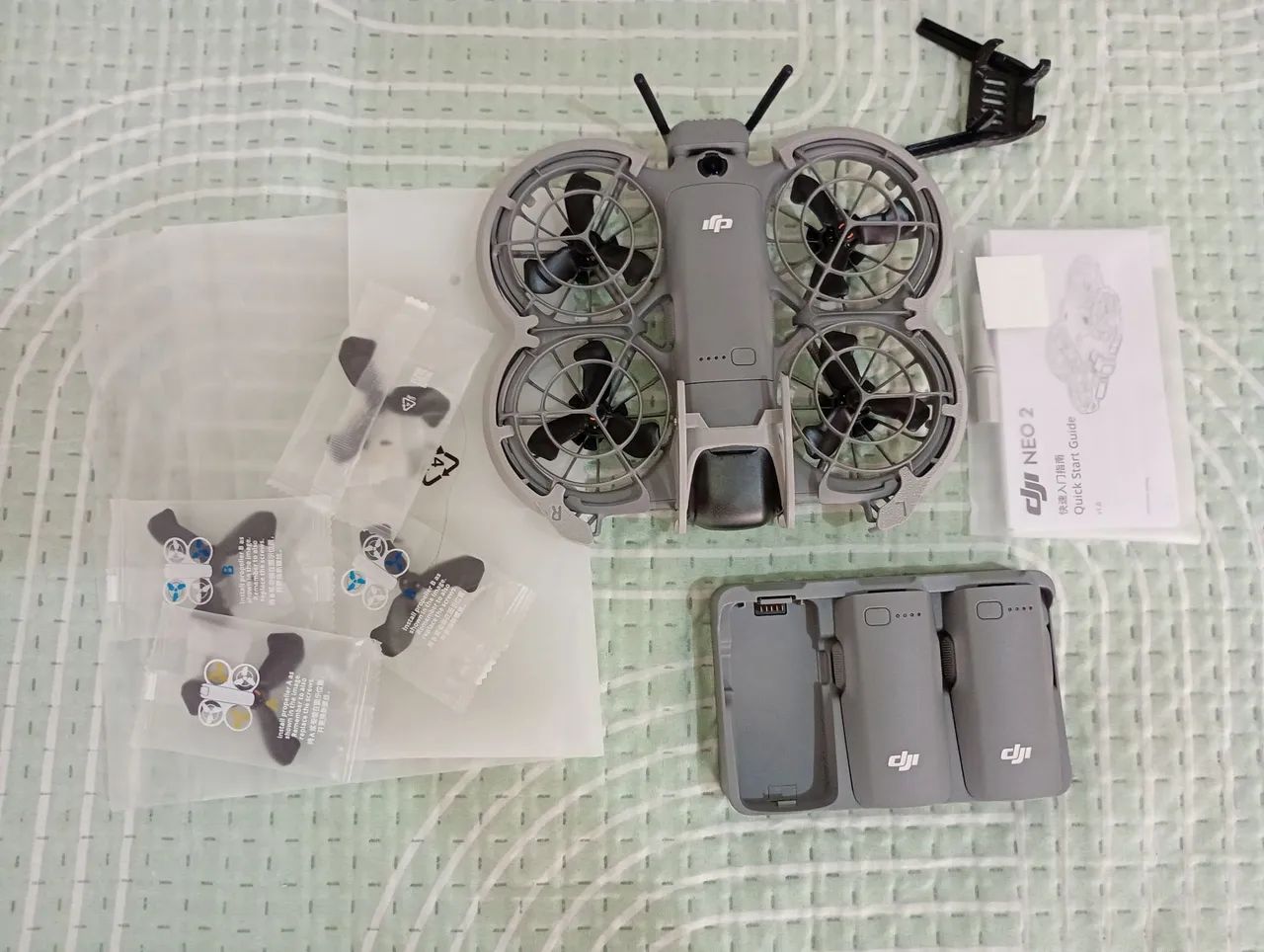 Neo 2 dji com 3 baterias,hub, módulo e armadura 
