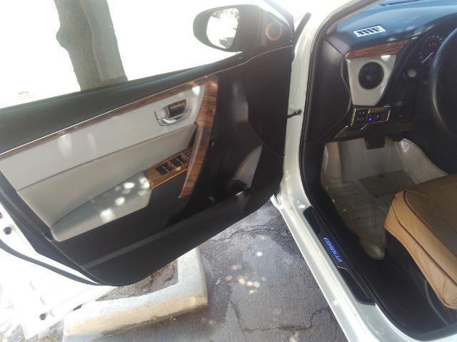 Vendo ou troco em carro de valor ate 30 mil,este corolla gli 2018 com acessorios do xei - Foto 18