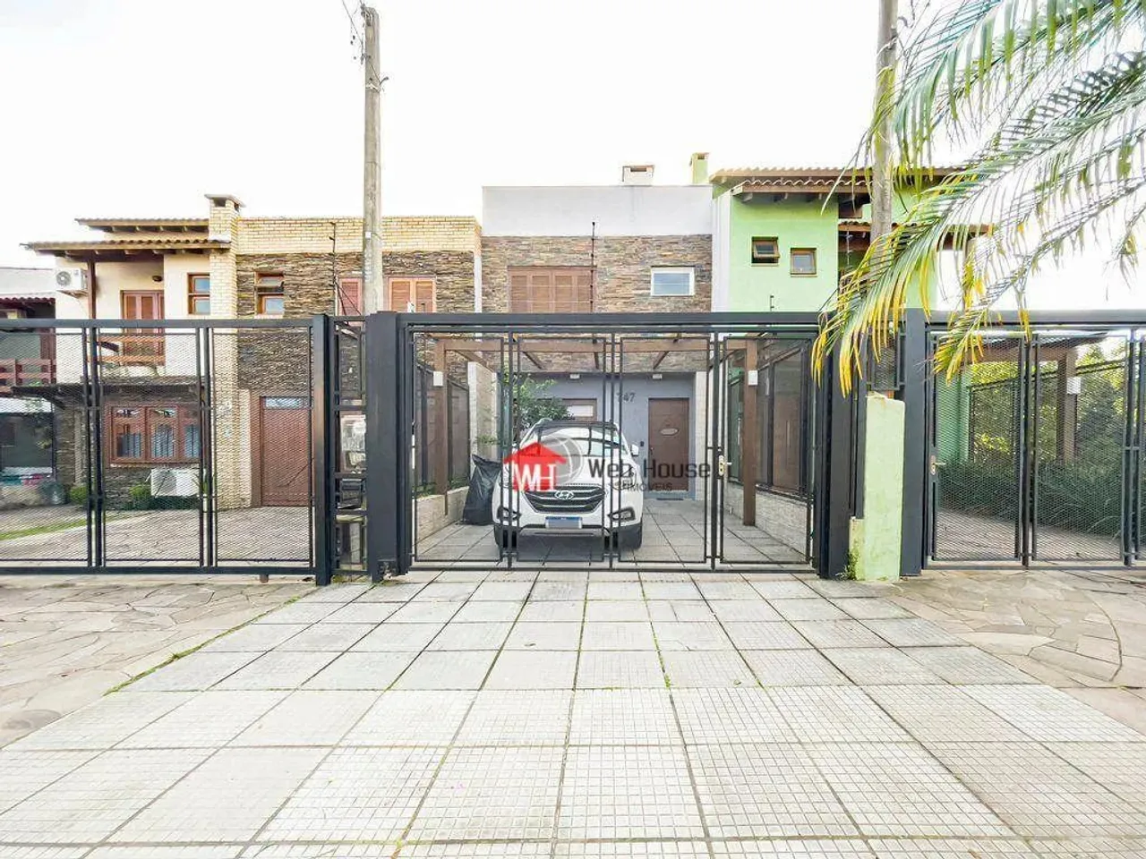 Sobrado com 3 dormitórios à venda, 105 m² por R$ 560.000,00 - Hípica - Porto Alegre/RS
