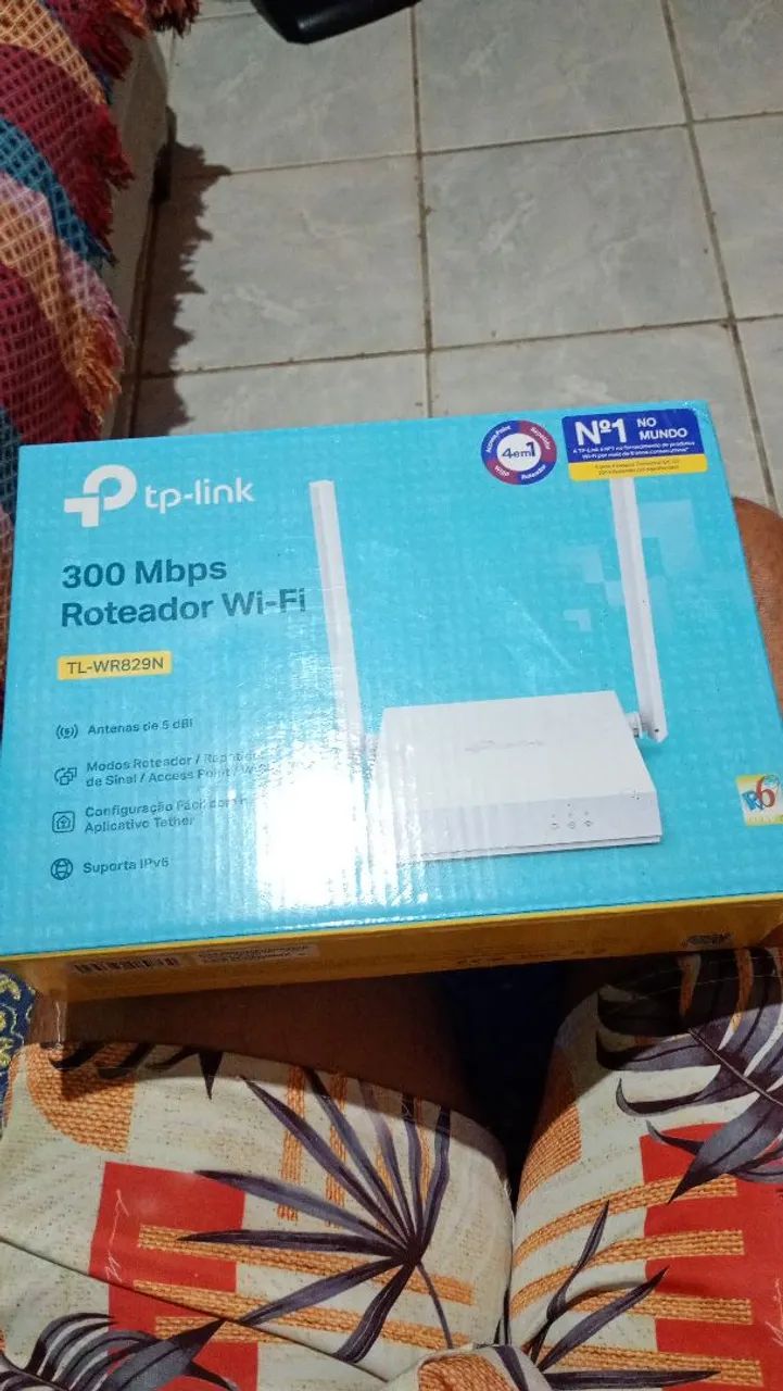 Vendo um roteador novo de marca tp-link