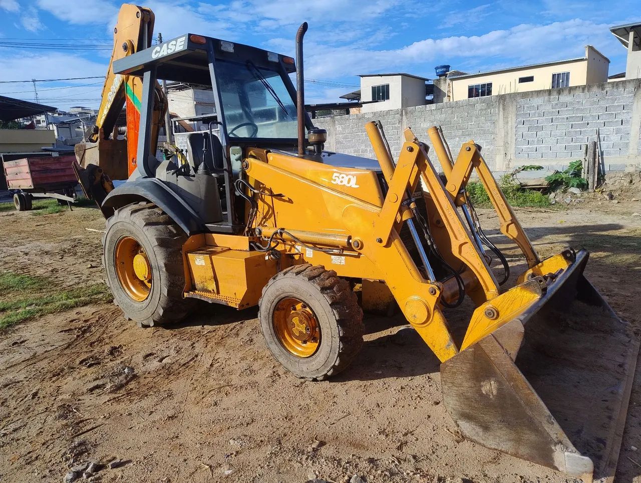 Retroescavadeira 580l  série 3 ano 2005