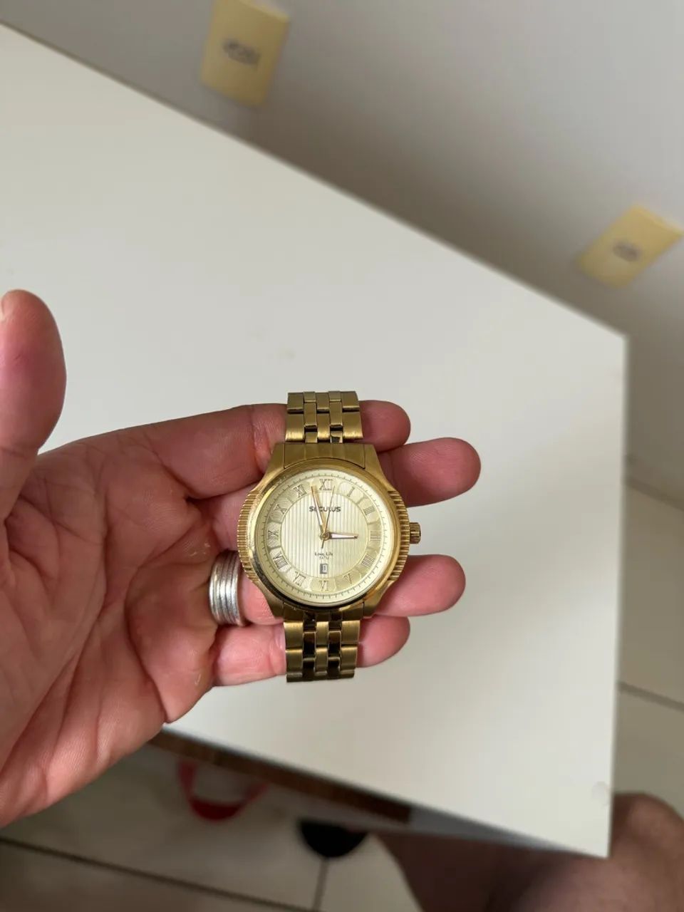 Relógio Seculus dourado 