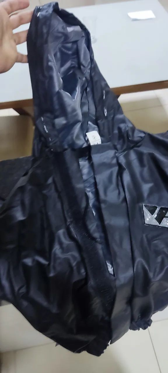Vendo capa de chuva infantil nunca usada - Foto 2