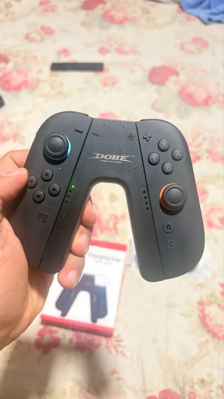 Joycon Nintendo Switch 2 + Grip Dobe (recarrega) - Foto 3