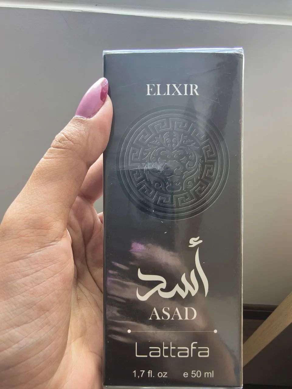 Perfume contratipo asad elixir