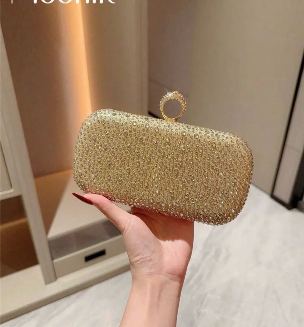 Clutch strass dourada