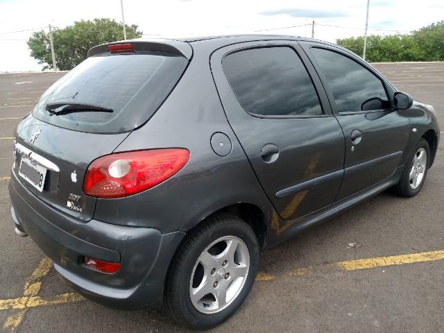 Peugeot 207 1.4 8v Flex 4 portas, Direção Hidraulica e Vidros Eletricos baixa Km - Foto 6