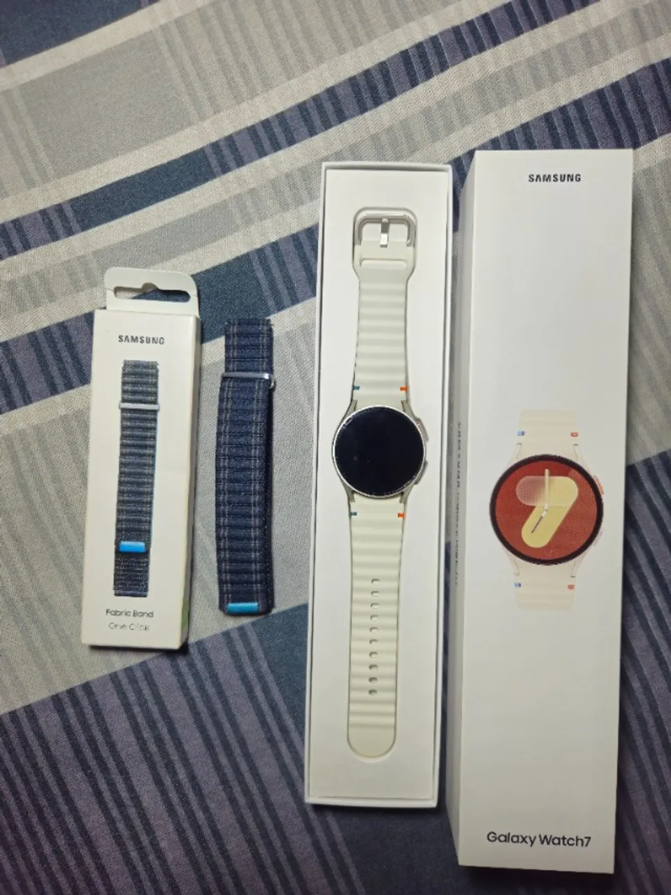 Kit Smartwatch Samsung Galaxy Watch7 40mm LTE + Pulseira Original Fabric Band + Película