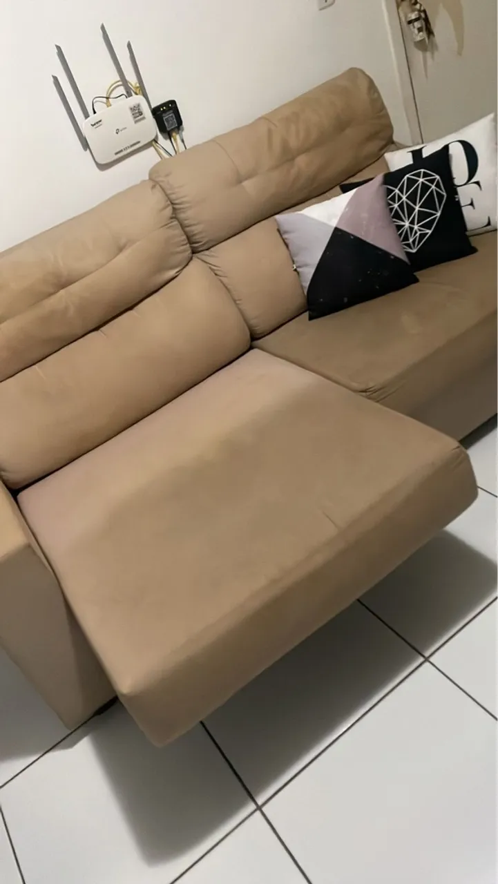 Sofá retrátil, que abre os dois lados e vira cama