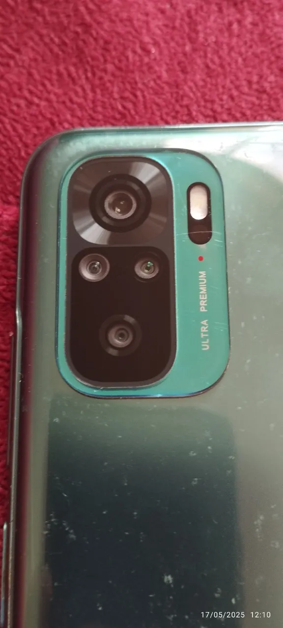 celular "Redmi Note 10" (modelo M2101K7AG) usado, mas tudo funcionando