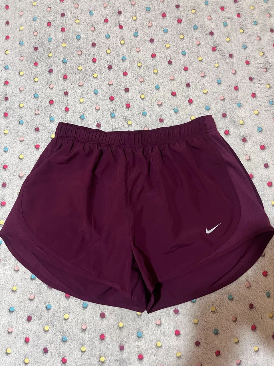 shorts nike tempo vinho
