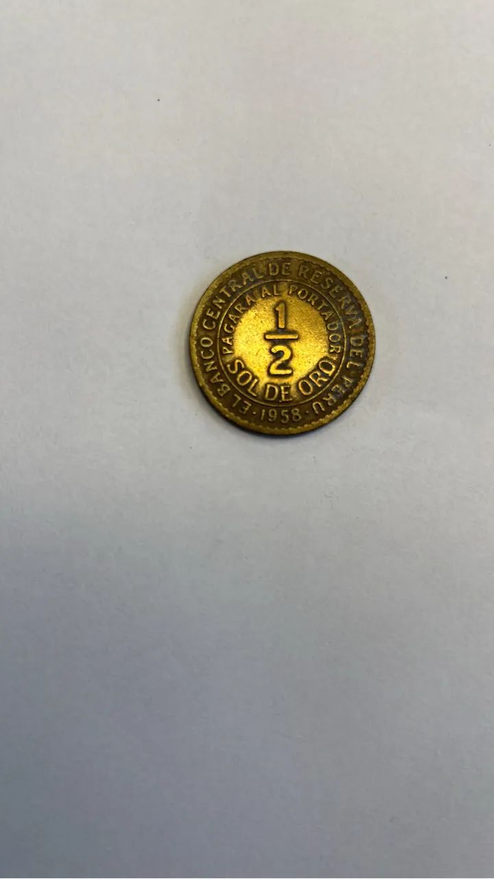 Sol de ouro 1958 (símbolo de cabeça pra baixo)