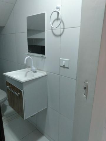 Casa tipo duplex 2 suítes, varandão, garagem coberta com cisterna e quintal Gigante - Foto 14