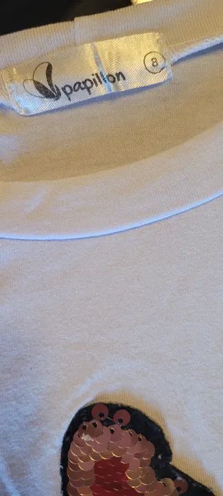 Camiseta branca paetê vai e vem papillon - Foto 3