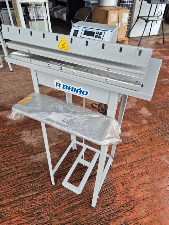 Seladora datadora de embalagens R BAIÃO