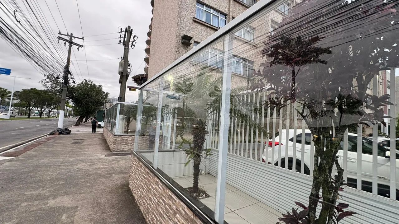 Apartamento de três quartos com suíte