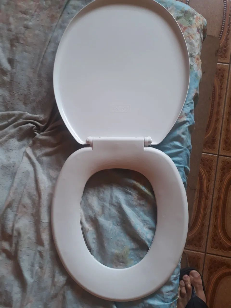 Assento de vaso sanitário