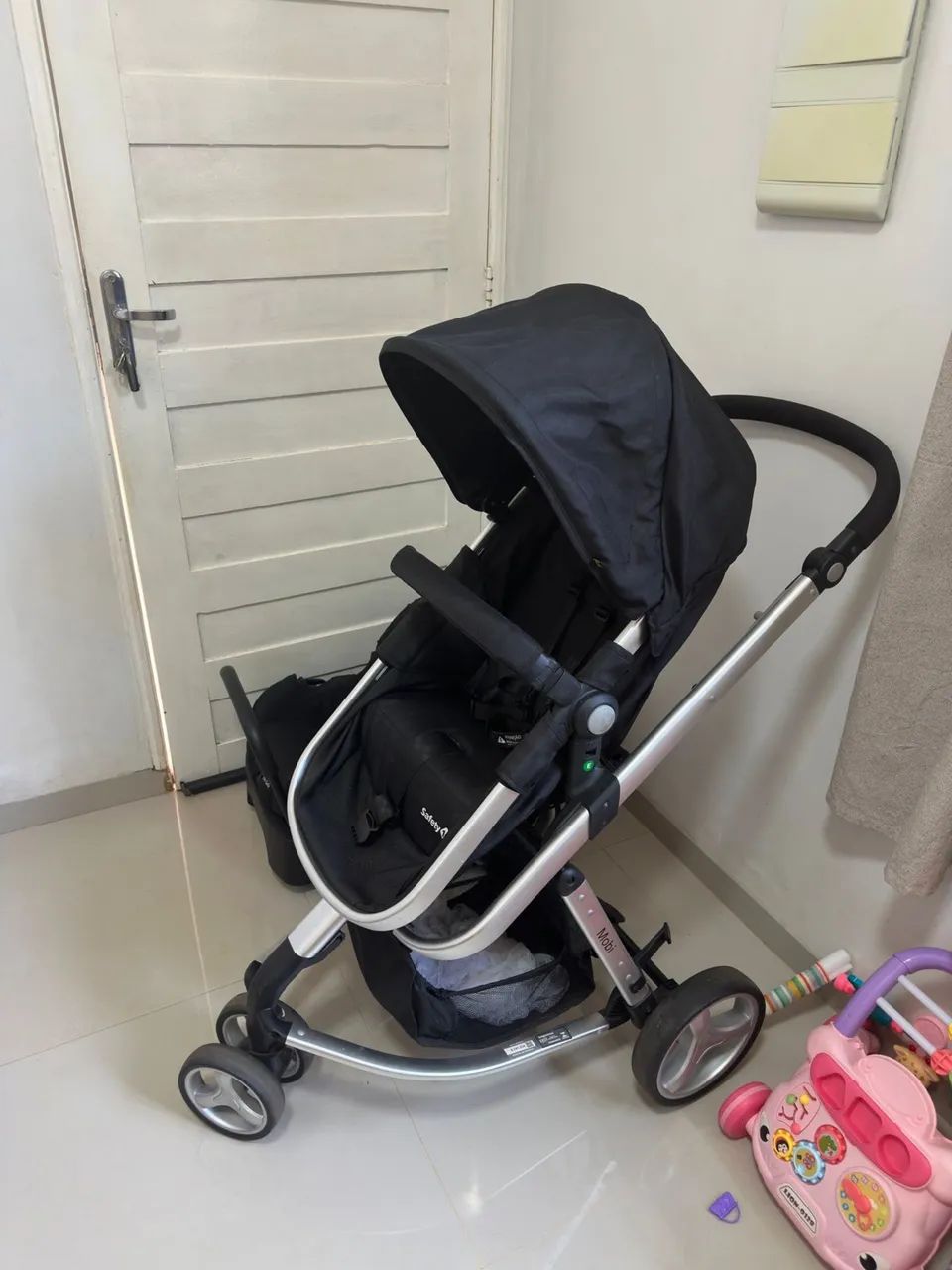 Carrinho com bebê conforto