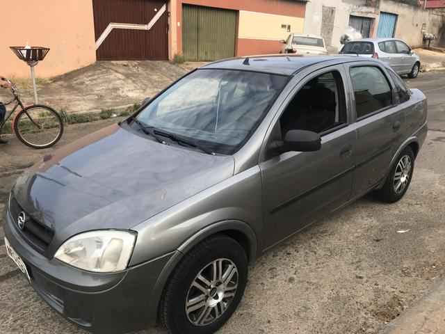 Corsa Sedan Joy 1.0 pego troca