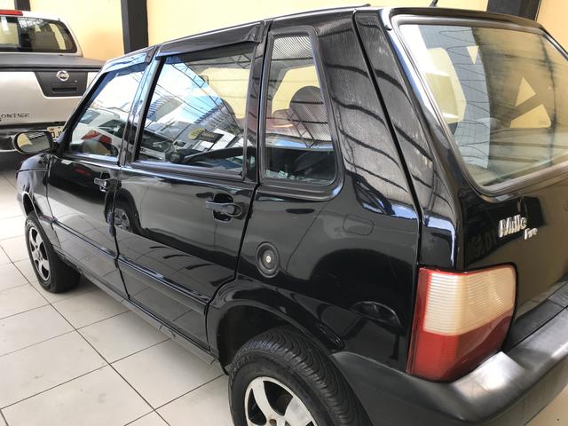 Fiat Uno Mille Fire Flex com AR Condicionado! - Foto 5
