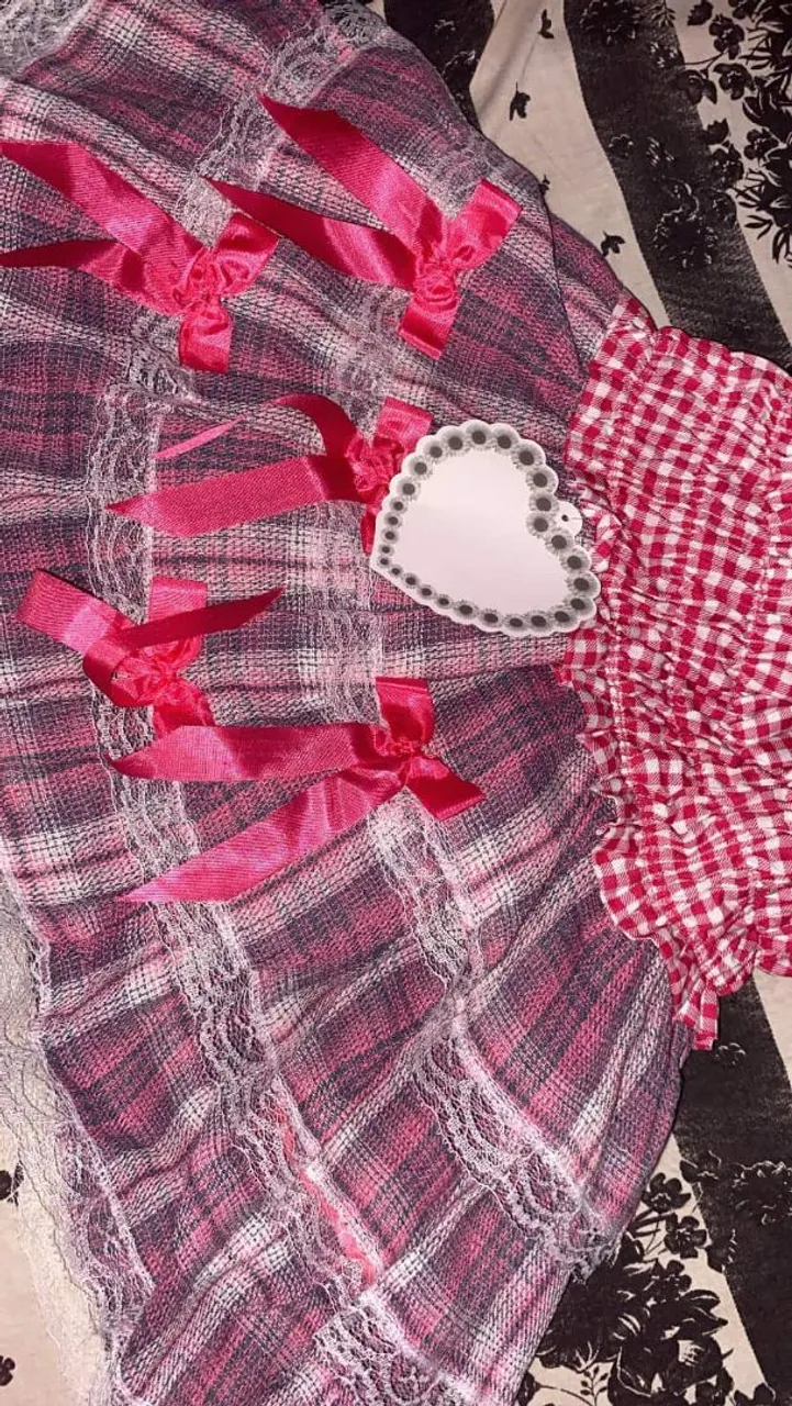 Saia xadrez com laços rosa