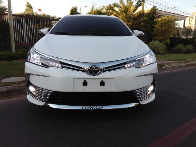 Vendo ou troco em carro de valor ate 30 mil,este corolla gli 2018 com acessorios do xei - Foto 8