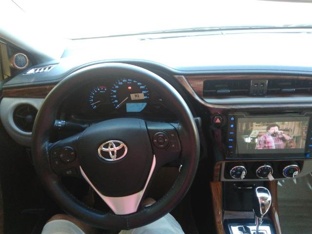 Vendo ou troco em carro de valor ate 30 mil,este corolla gli 2018 com acessorios do xei - Foto 7