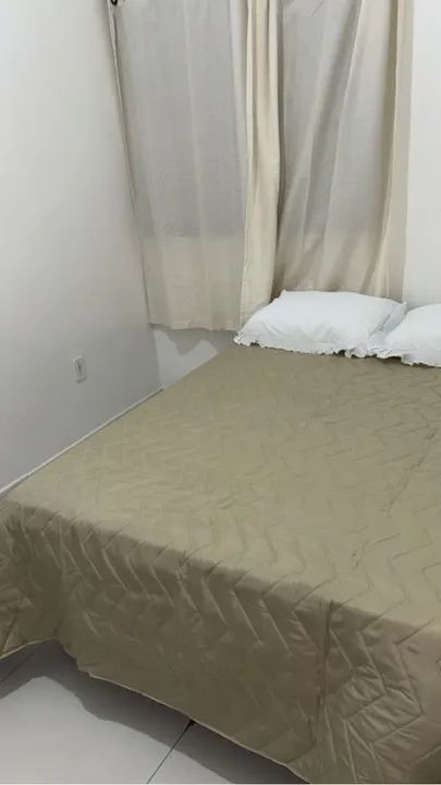 Casa com dois quartos banh. social e suite, garagem portão eletrônico