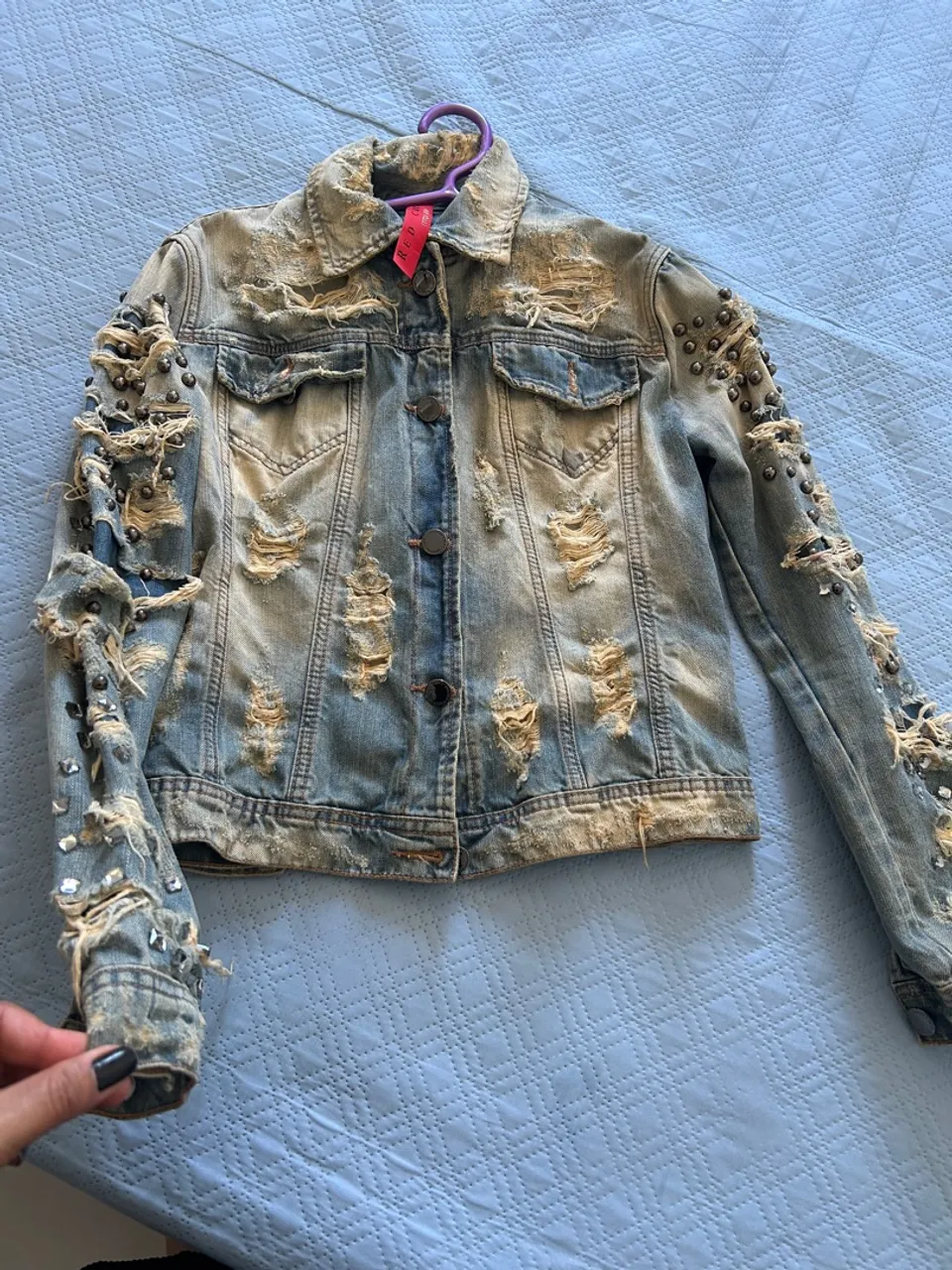 Jaqueta jeans marca Lança Perfume