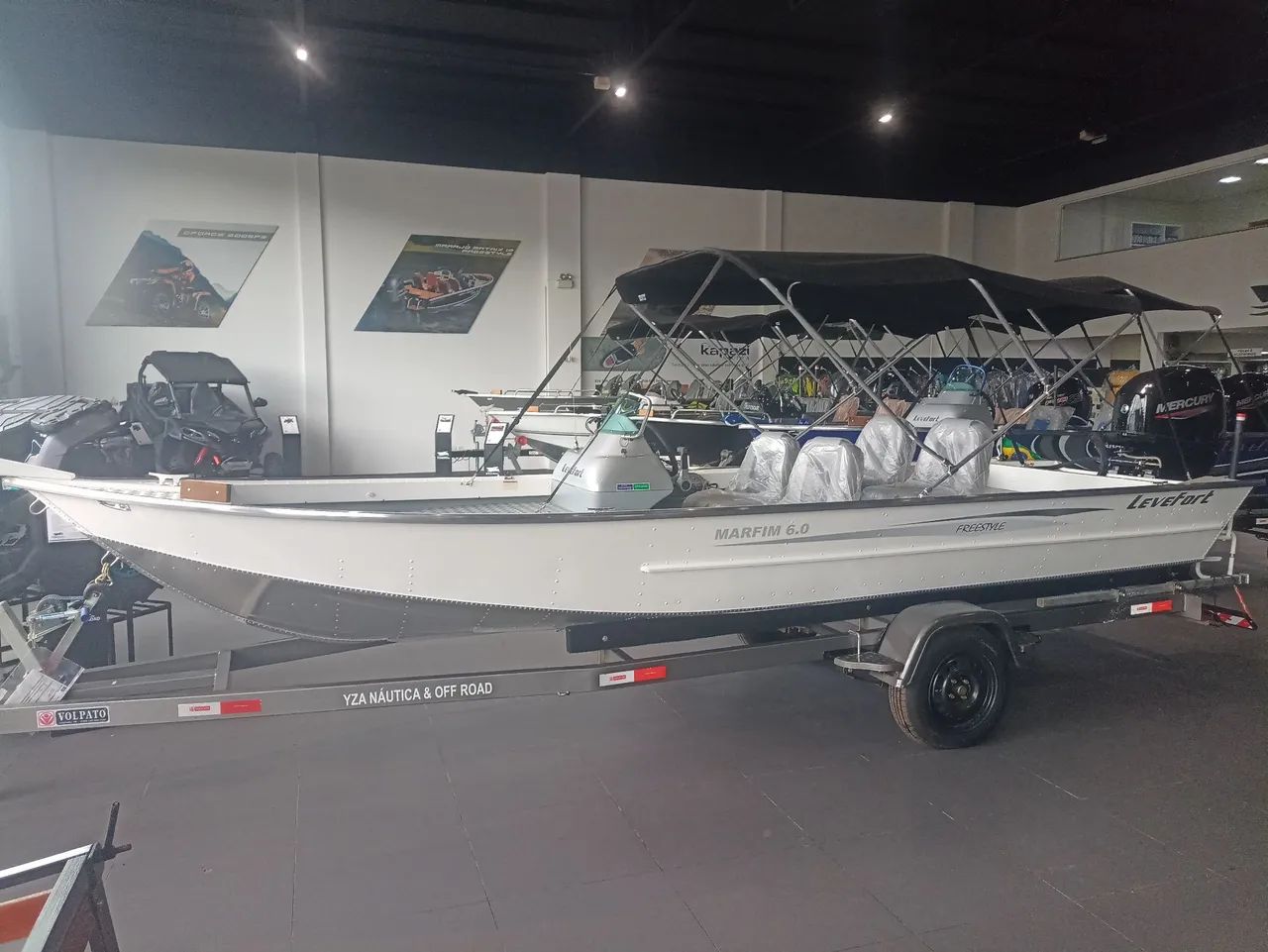 Lancha marfim 6.0 + motor 60hp Mercury  - Foto 4