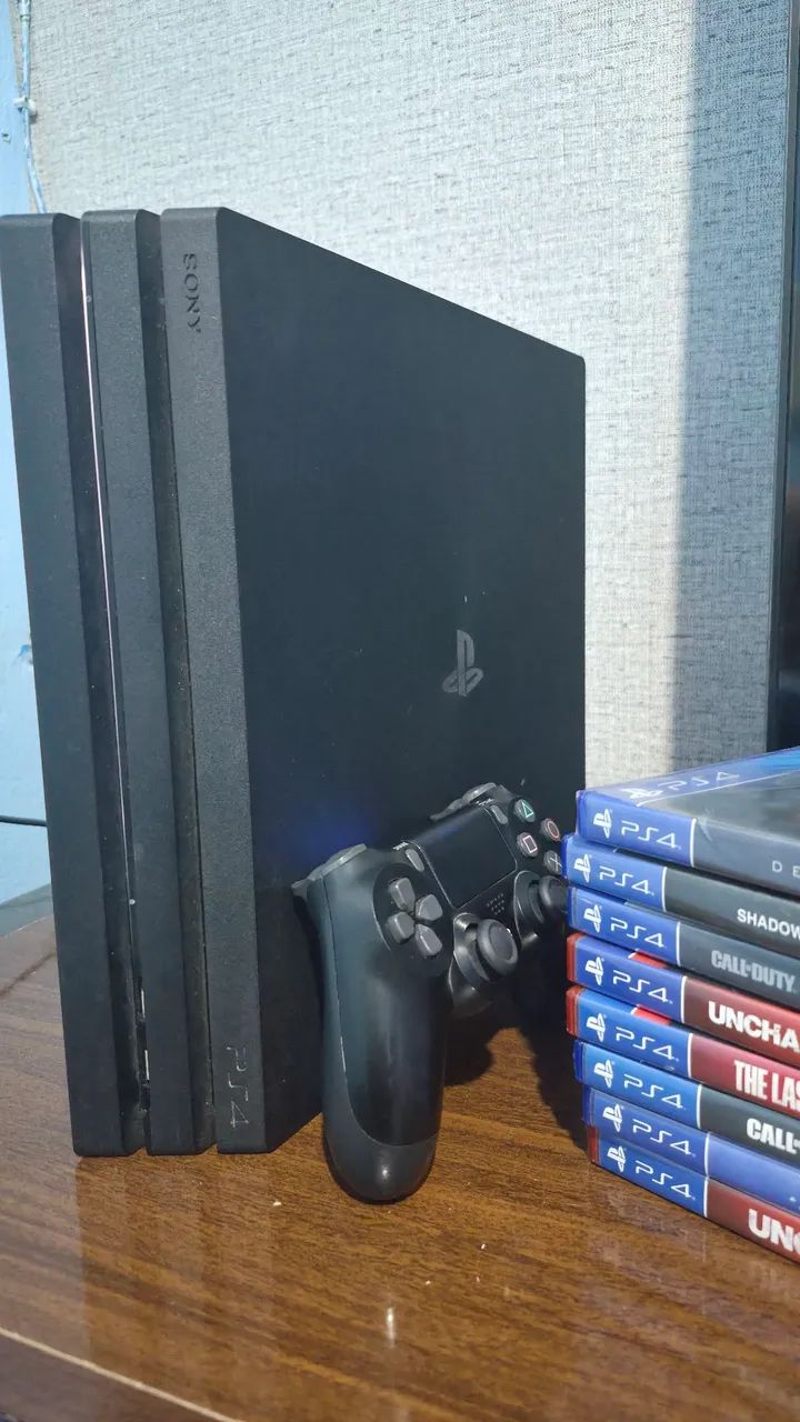 Ps4 Pro 1Tb + 8 jogos - Foto 4