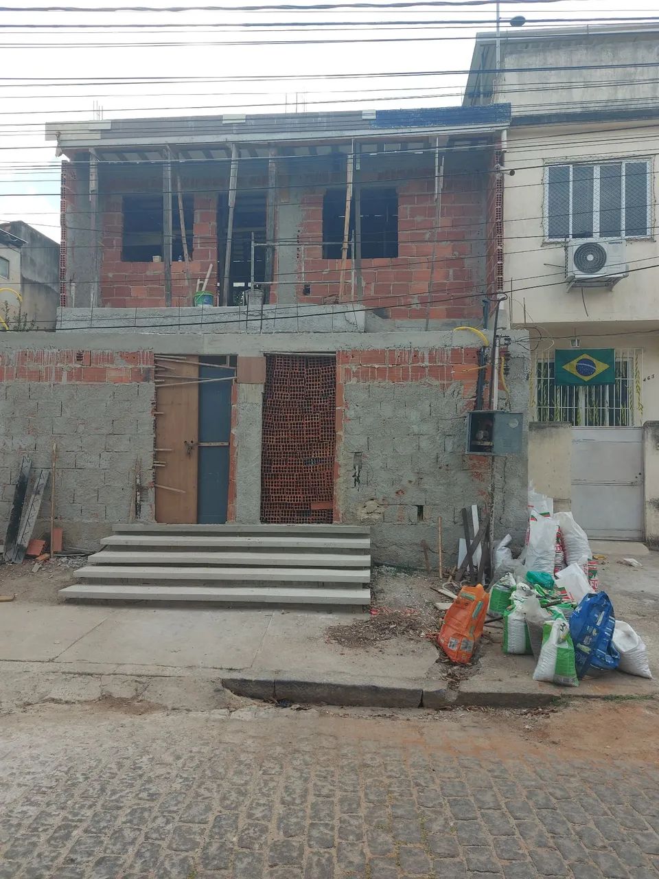 Pedreiro embolso Reboco