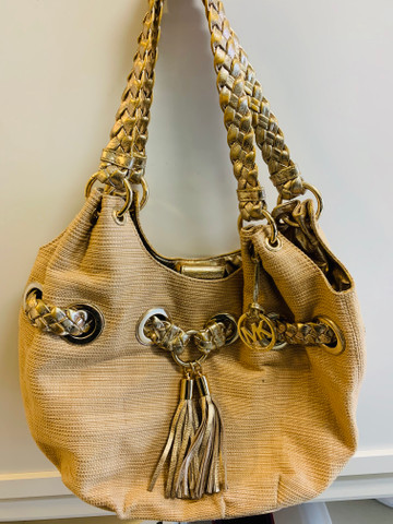 bolsa mk dourada original