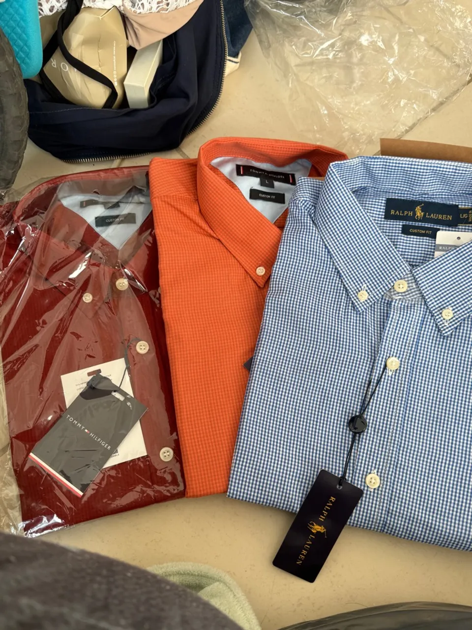 Camisas xadrez e lisas do P ao GGG