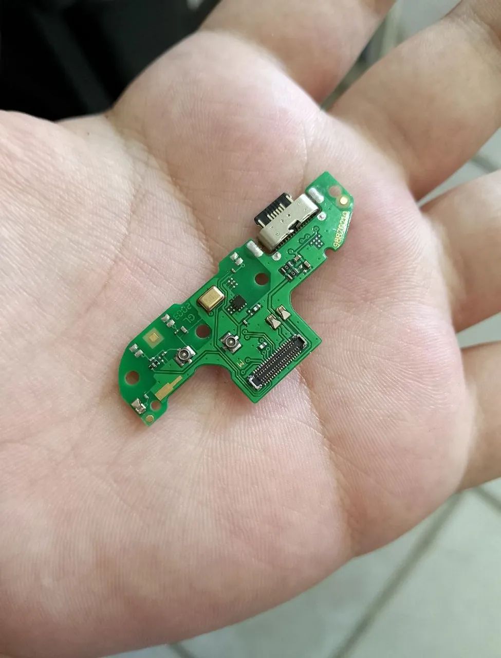 Placa de carga do Motorola onde macro