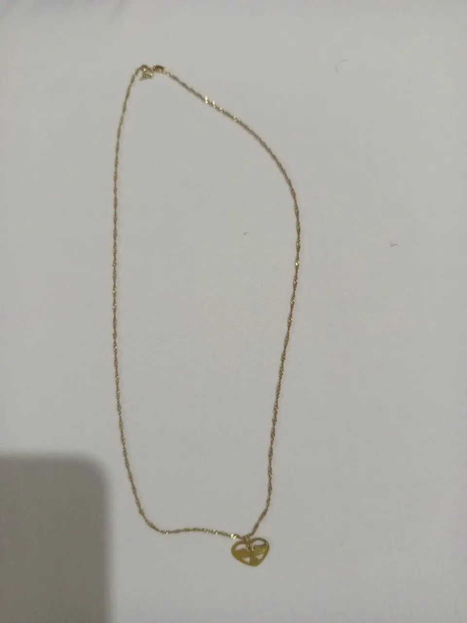 Corrente de ouro com pingente de coração