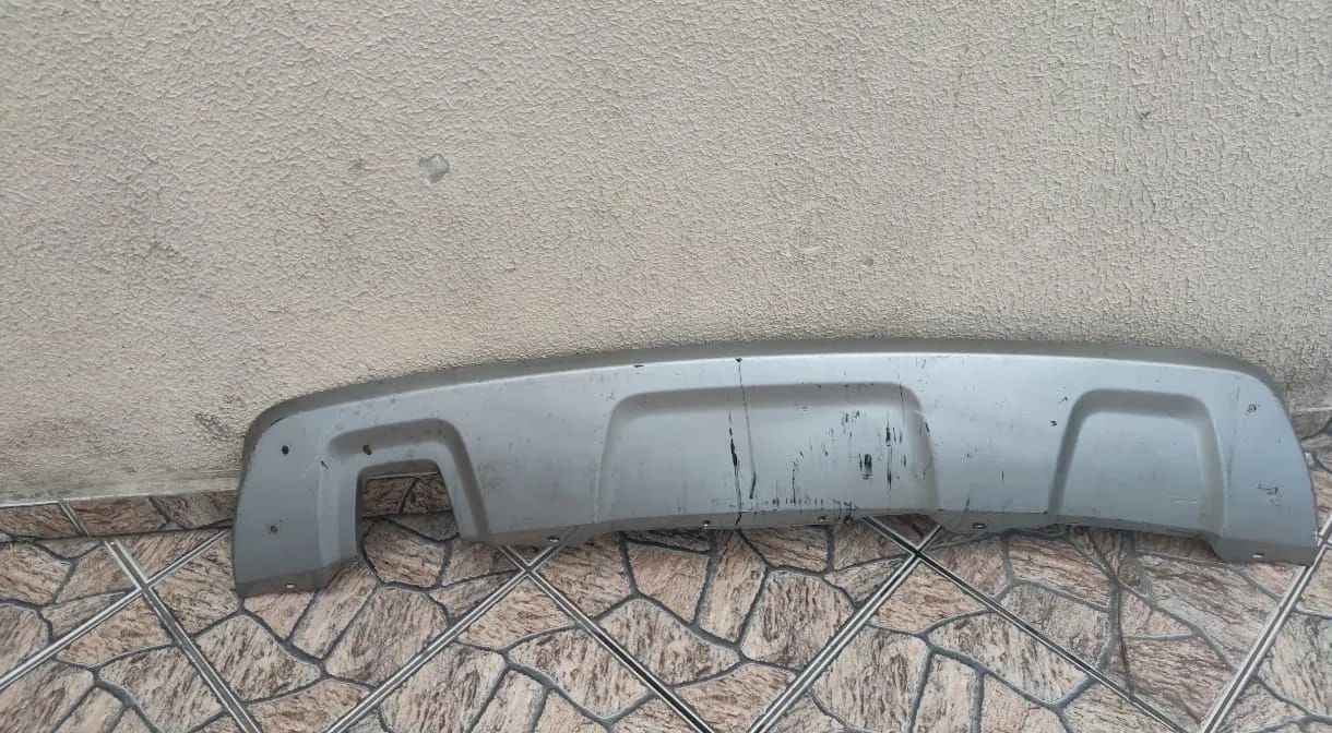 APLIQUE DO PARACHOQUE TRASEIRA DA RENAULT DUSTER 2013