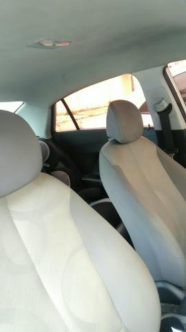 Vendo ou troco por ônix HB20S 2015 sedan na cor prata - Foto 4