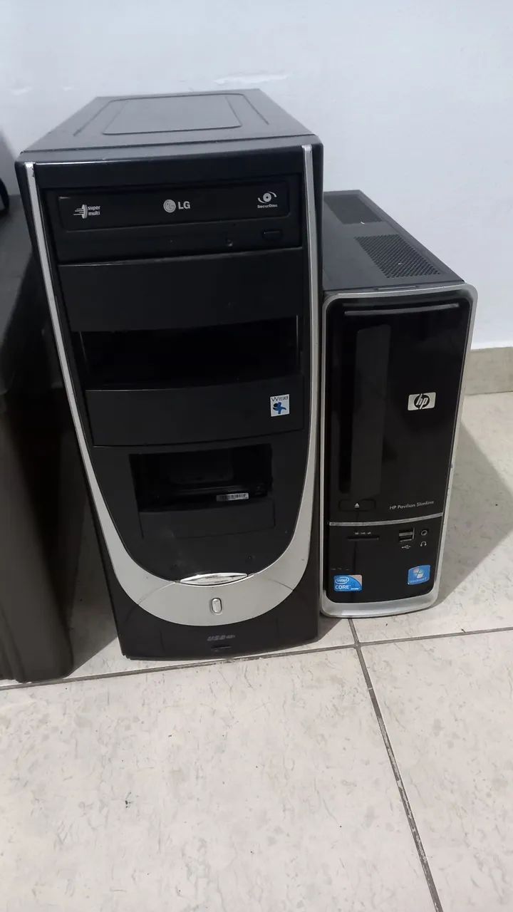 Computadores parados HP e LG.