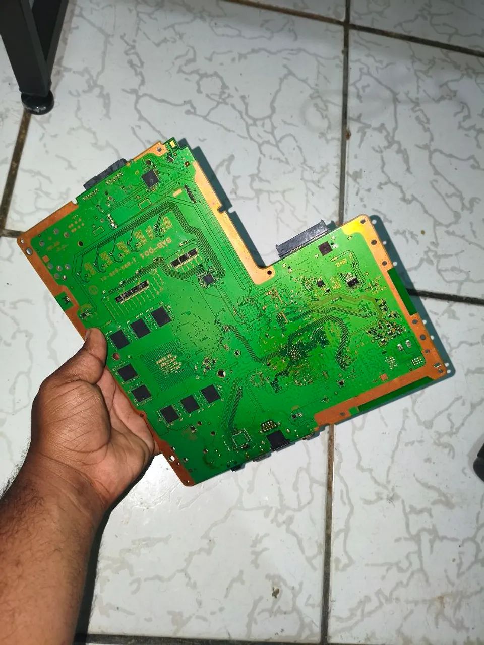 Placa mãe de ps4 com defeito 