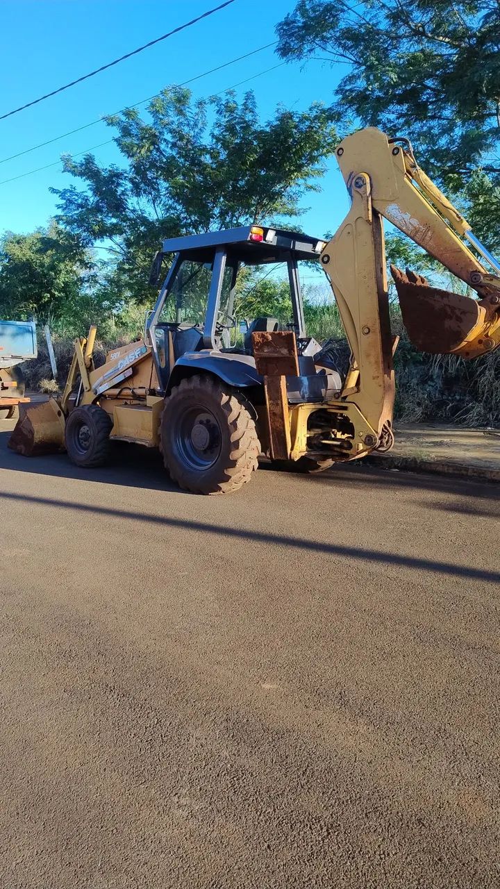 Retroescavadeira 580L - Foto 5