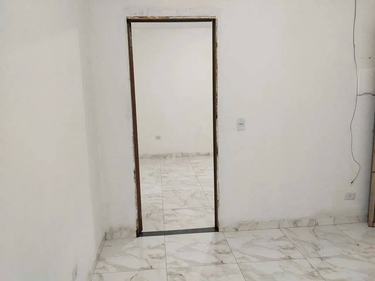 Alugar se uma quitinete espaço sala e cozinha junto e um quarto suite 